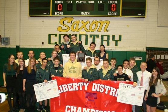 Varsity wrestling wins districts