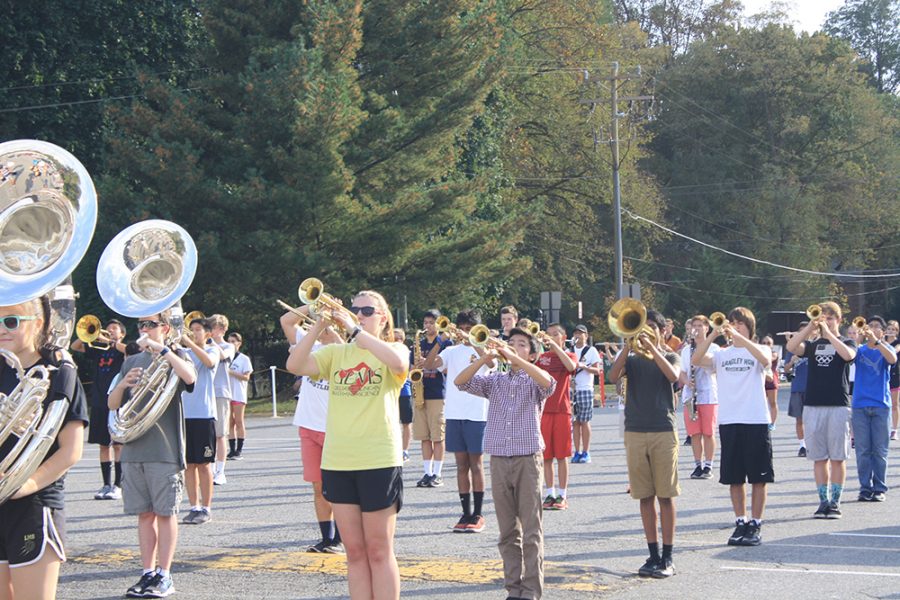 Students practice for their upcoming performance at the home football game after school. (Photo by Nik Popli, Managing Editor)