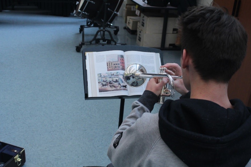 Students that actively participate in music are typically better students overall. Langley’s band, orchestra and choir programs have included award-winning ensembles over the years, with each group having earned top marks annually at their yearly assessments.
Photo Of Max Dallas, a trumpet player in the Langley Wind Symphony