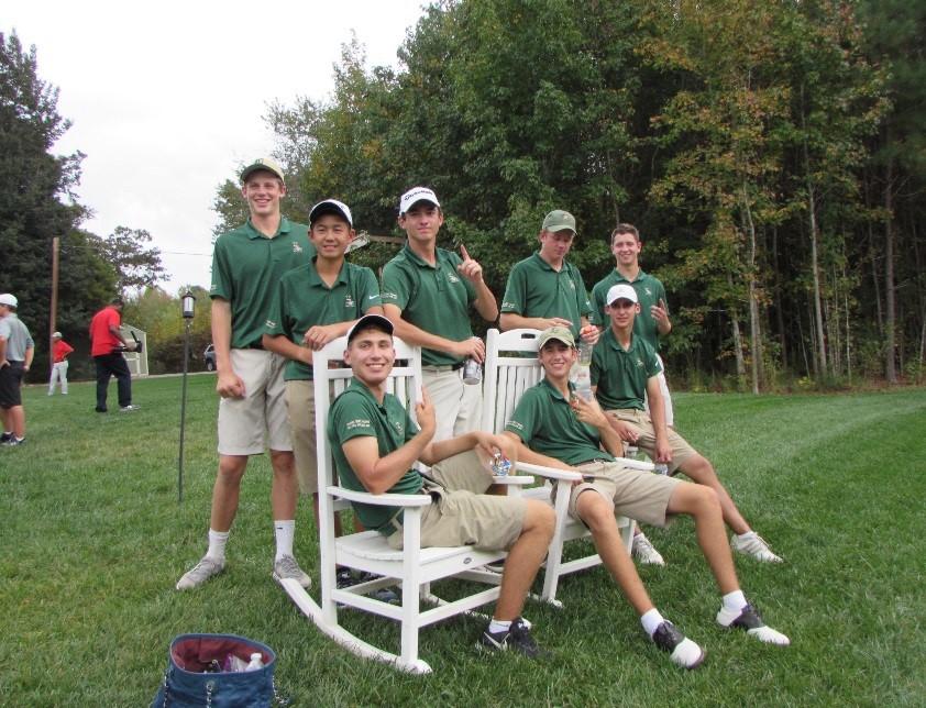 The Saxon golf team relaxes following their win