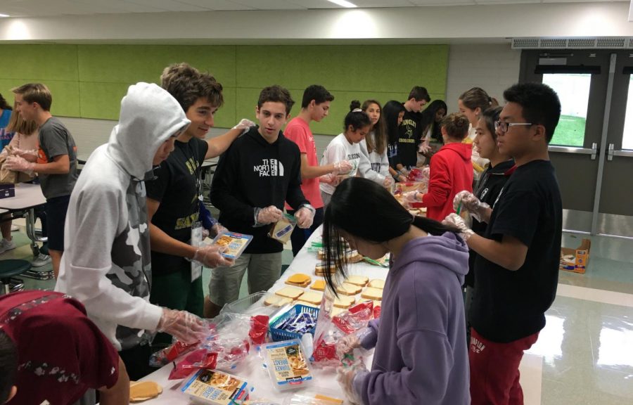 Students gather together once a month to engage in service activities like making toys, writing letters, and organizing crafts (Photo by Aisha Shakeel).