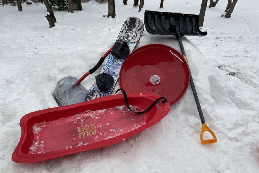 To many school aged children, sledding is one of the highlights of every snow day. Neighborhood sledding hills become a meeting place for neighborhood thrill-seekers (Photo by Boden Gentile).