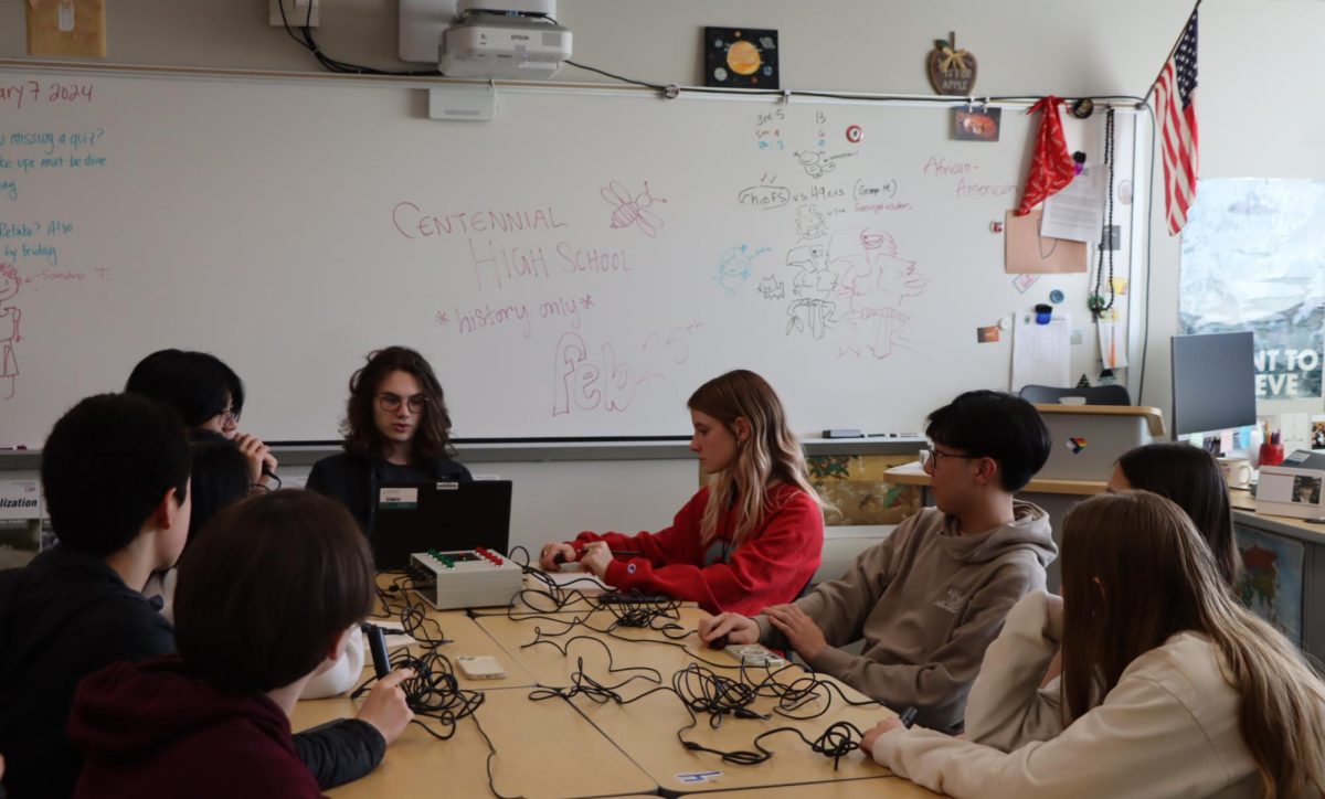 Hoffman reads questions, while Mosby keeps track of score. The quiz bowl practices every Wednesday in Banker’s room.
